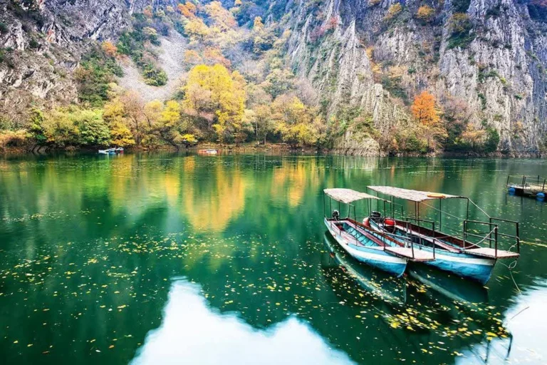Matka Canyon lake and traditional boats in autumn, North Macedonia