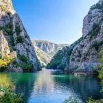 Matka Canyon Tour from Skopje with stunning canyon, emerald lake and dramatic cliffs in North Macedonia